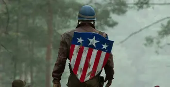 A man wearing a helmet and a shield.