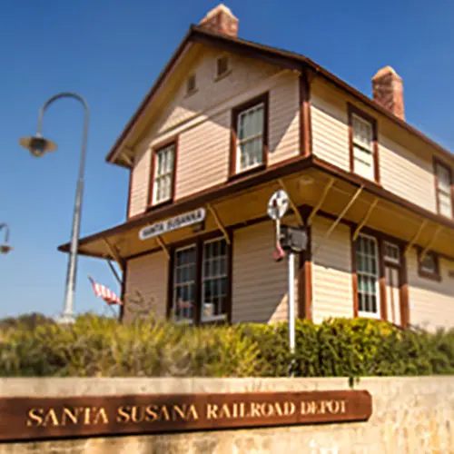 A building with a sign on the side.