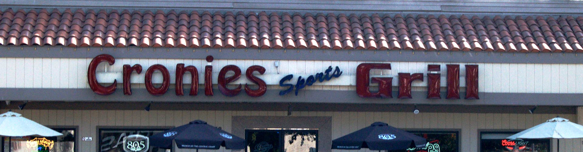 A restaurant with a sign that says cronies grill.