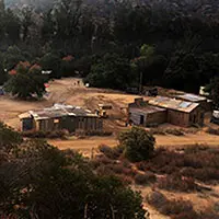 An aerial view of a small village in the desert.